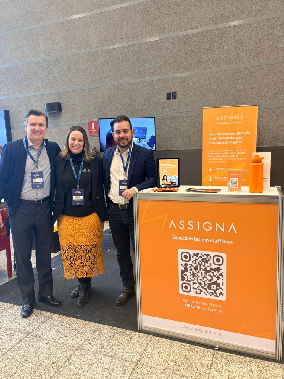 Equipe Assigna em evento institucional